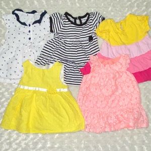 Lot of 10 baby girl dresses. 12 months.